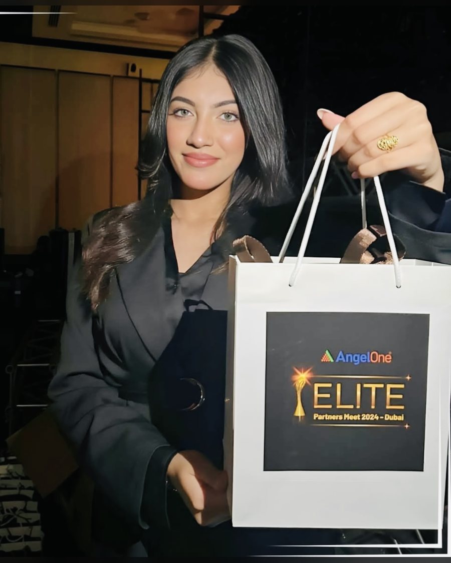 Host with a gift bag at the AngelOne Elite partners meet in Dubai