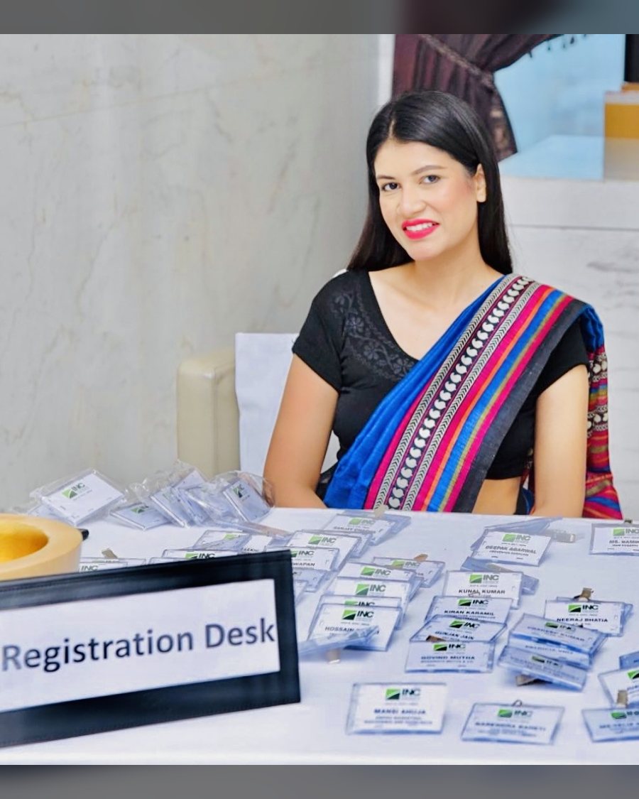 Registration desk hostess at a corporate conference
