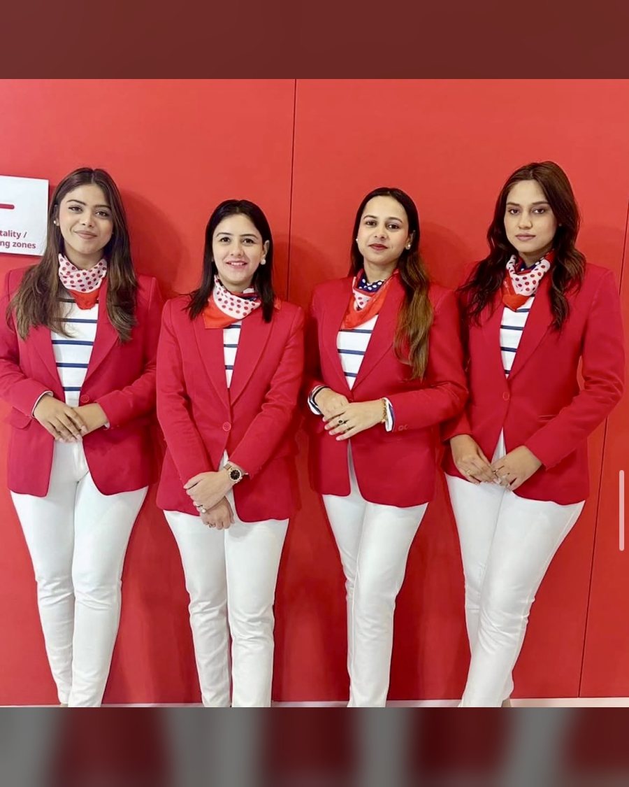Uniformed hostess team meeting grooming standards