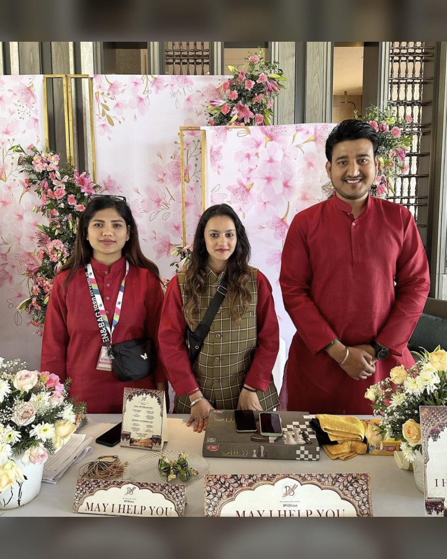 Floral welcome desk team asking may I help you